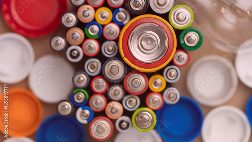 фотографія A bunch of batteries are scattered on a table