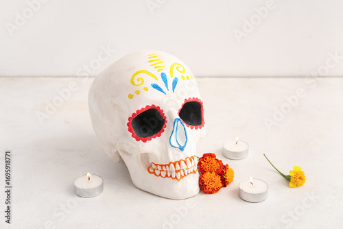 Candles with marigold flowe...