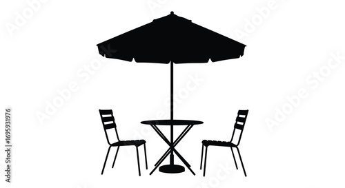 a cozy outdoor seating area with umbrella table and chairs