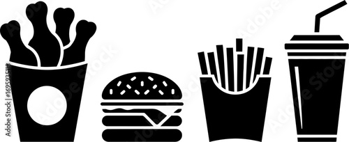 Classic fast food meal with burger, fries, fried chicken, and soda