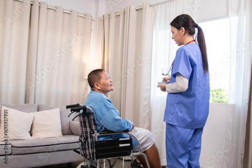 Fotografia Elderly and caregiver, nurse healthcare routine, encouraging gentle exercise whi