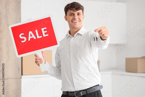 Male real estate agent with...
