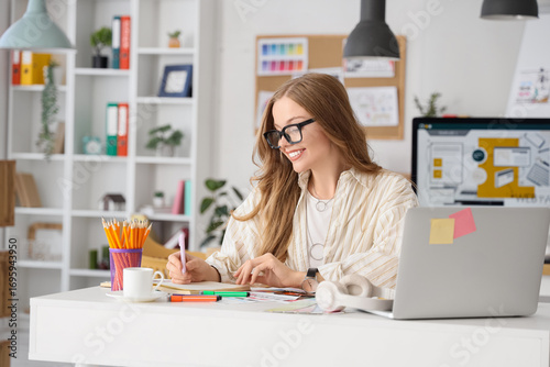 Female web designer working...