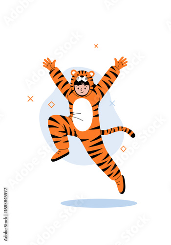 Joyful child in vibrant tiger costume leaping with excitement, perfect for playful themes