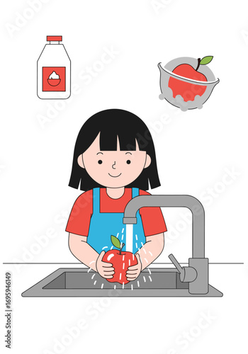 Little girl happily washing a fresh red apple under running water at the sink for healthy eating