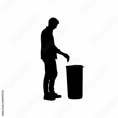 Silhouette of a man throwing trash into a dustbin for public cleanliness awareness