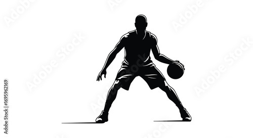 a silhouette of a basketball player dribbling ball