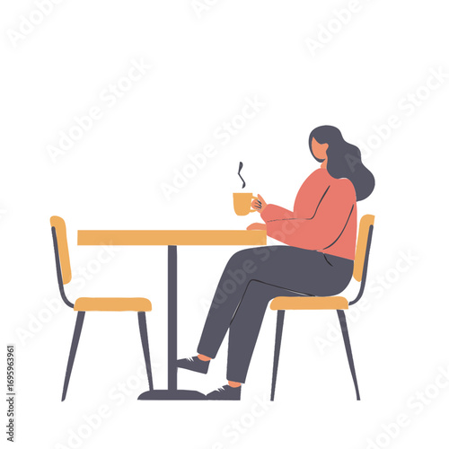 Woman sitting at a table with coffee, enjoying a moment of relaxation
