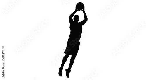 a basketball player silhouette leaping high to shoot ball