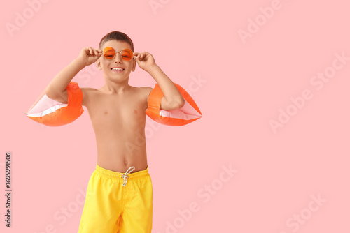 Cute little boy with inflat...