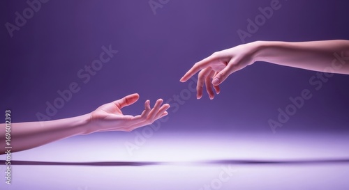 Reaching Out: A tender moment of connection is frozen in time as two hands, bathed in a gentle purple light, almost touch, capturing a moment of yearning or unity.