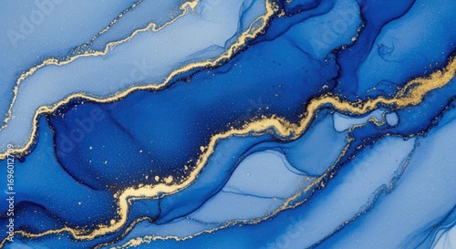 Abstract Blue Marble Artwork: A striking abstract composition featuring swirling shades of blue, accentuated with golden veins, creating a sense of depth and fluidity.