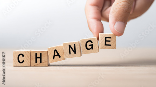 Change concept hand wooden block letter word motivation positive transformation improvement progress hope future business success opportunity growth inspiration idea planning solution decision