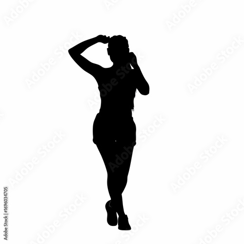 Silhouette of a woman exercising at sunrise promoting fitness and wellness