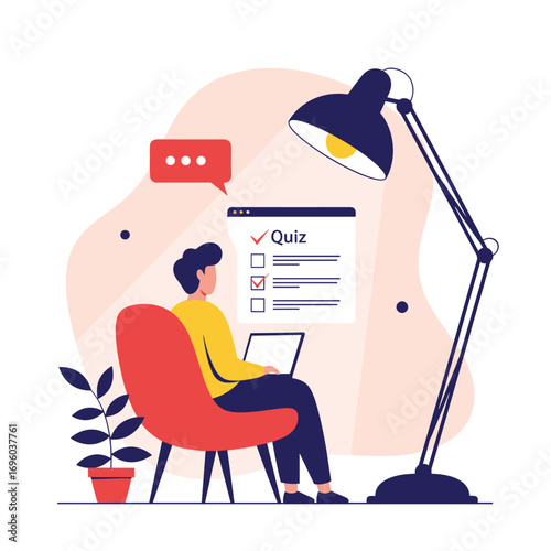 Online quiz participation using a laptop while sitting in a chair with a desk lamp illuminating the scene