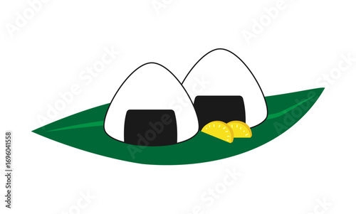 笹の葉にのったおにぎりと漬物のイラスト