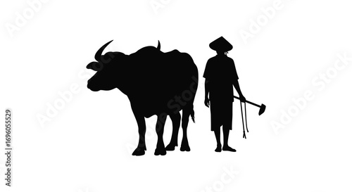 a farmer stands beside his loyal ox holding a tool