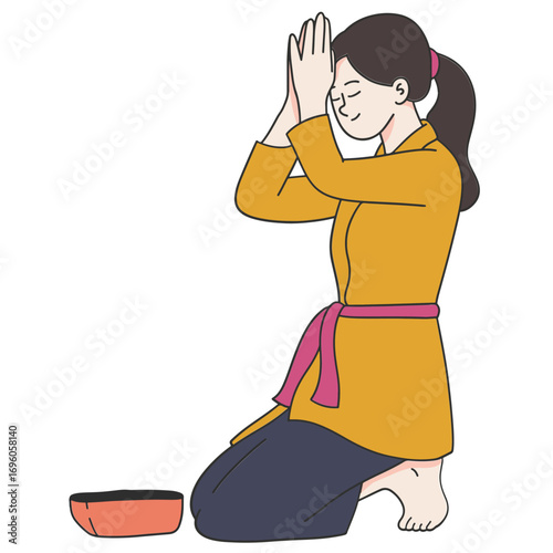 Balinese woman praying