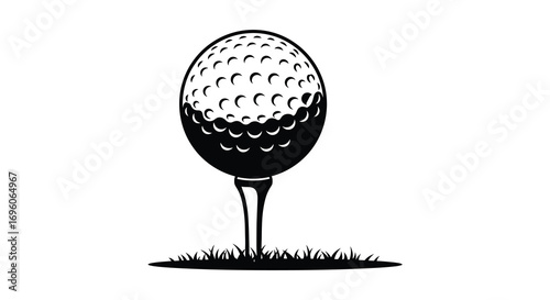 a golf ball resting on tee above grassy surface