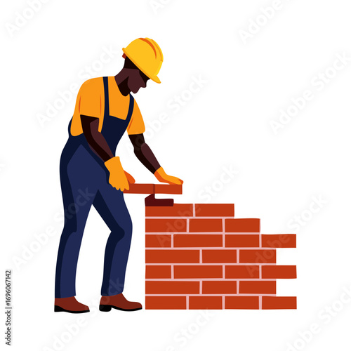 Worker building a brick wall