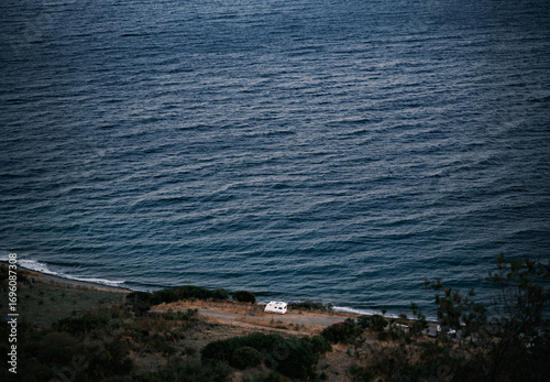 A caravan reminiscent of Breaking Bad is parked by the sea. Far from everyone and everything.
