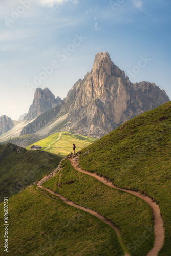 mountain landscape in the mountains with a woman making scale