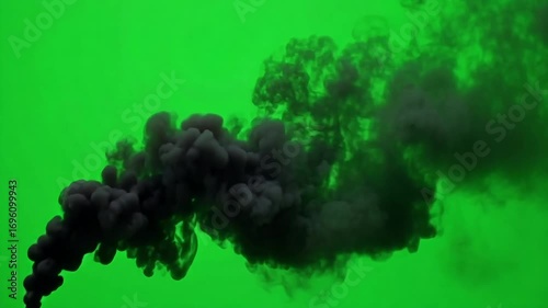Dramatic black smoke billows against a vibrant green screen backdrop.