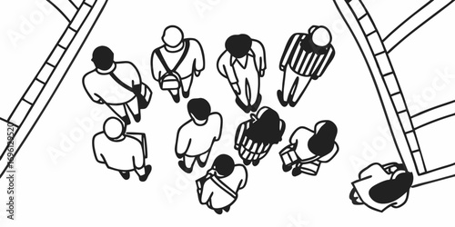 Overhead view of a group of people standing in an open space with buildings on either side of them
