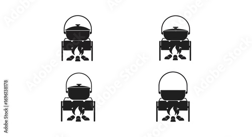 a set of four traditional cooking pots arranged neatly