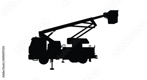 a silhouette of utility truck with extended crane arm