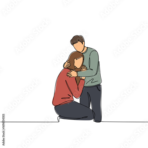 Young couple embracing and comforting each other in sadness  