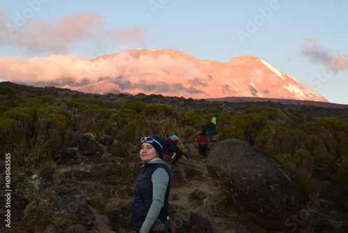 Woman is hiking in mountains, Kilimanjaro
