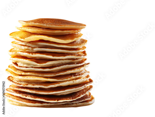 tall stack of pancakes with syrup