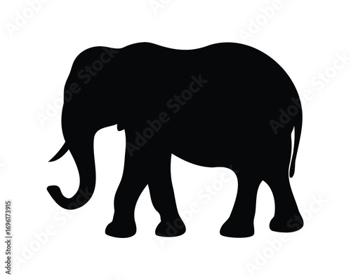 Black silhouette of a majestic elephant gracefully walking across the plains