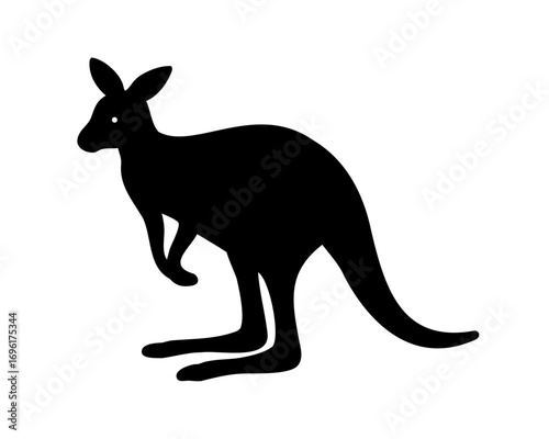 Striking silhouette of an iconic kangaroo standing tall in the outback