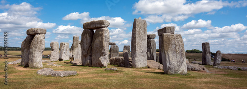 ancient ruins of stonehenge under blue sky