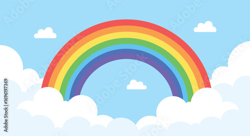 Vibrant arch of colors graces a bright sky filled with fluffy white clouds