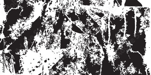 Abstract black and white grunge texture with distressed scratches splatters and rough edges.