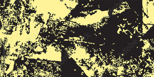 High-contrast abstract grunge texture with chaotic black splatters and jagged shapes on a pale yellow background.