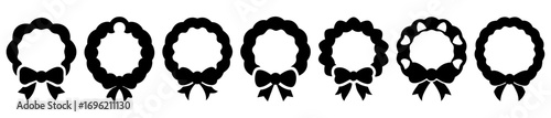 Collection of seven decorative wreaths, each with a unique style and bow