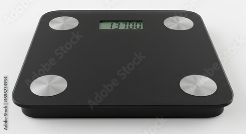 A black digital scale with four circular metal sensors displaying 13700 on its green screen