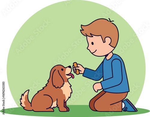 A young boy kneeling down to give his puppy a treat.