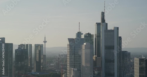 drone footage of frankfurt skyline and skyscrapers during daytime