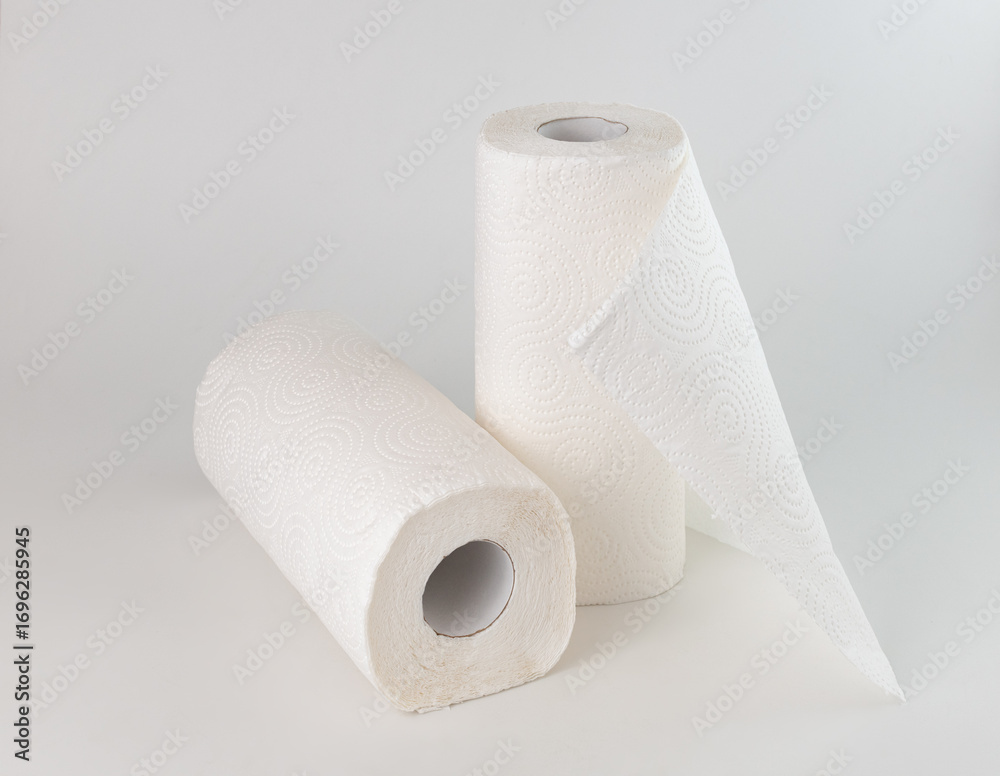 Fototapeta premium two rolls of paper towels on a white background