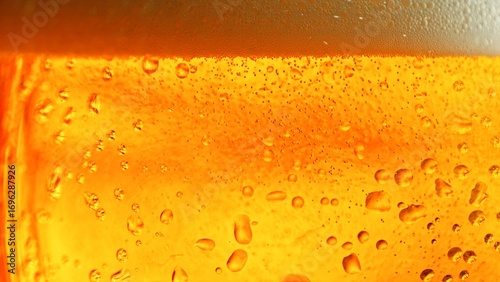 Macro Shot of Pouring Beer ...
