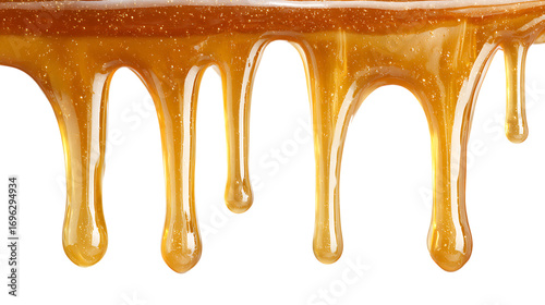 Golden honey or caramel drips isolated on transparent background.