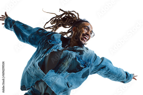 Man with dreadlocks feeling joyful and free, dancing with arms outstretched.