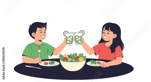 Two happy children toasting with drinks celebrating a healthy meal together at the table