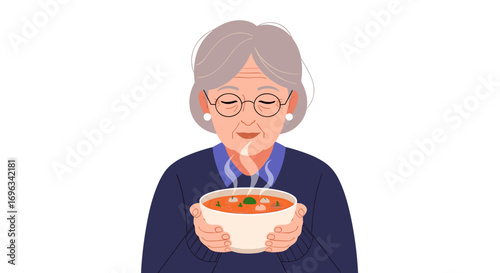 An elderly woman enjoys a warm comforting bowl of delicious homemade soup on a cold day