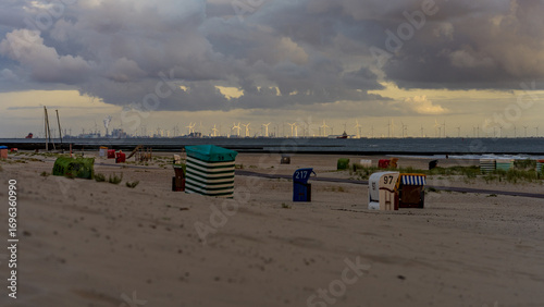 Wallpaper Mural Beach chairs on Borkum beach with view towards Eemshaven and wind turbines Torontodigital.ca